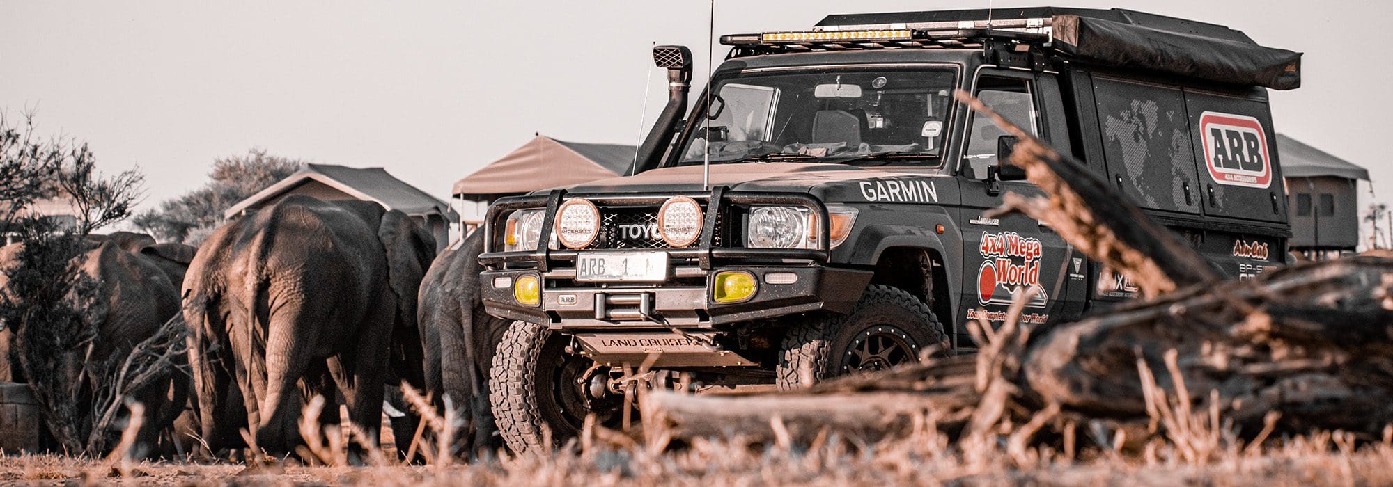 Toyota Land Cruiser 70-series with rooftop tent at Elephant Sands, Botswana