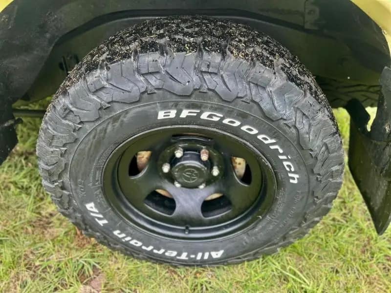 BFGoodrich All-Terrain KO2 tyre on a black steel rim, fitted to a Land Cruiser 80 Series