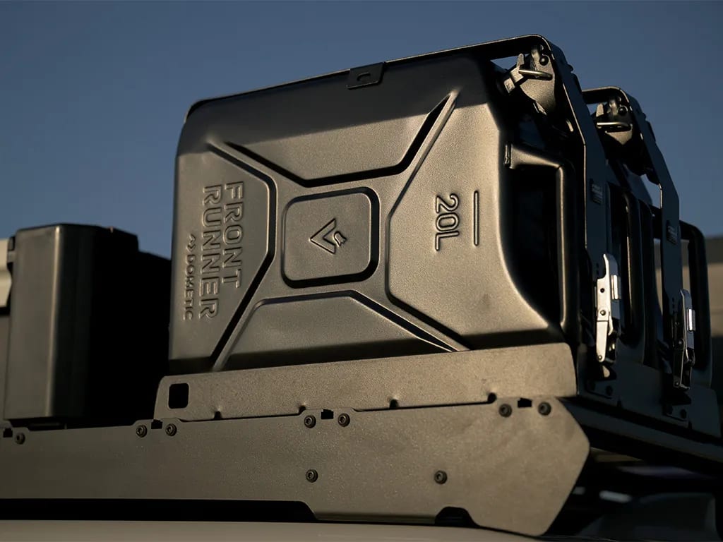 A 20 litre steel jerry can locked into a black double jerry can holder on a vehicle rack